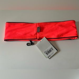 FlipBelt (Neon Punch) storage for phone and keys while you work out!
